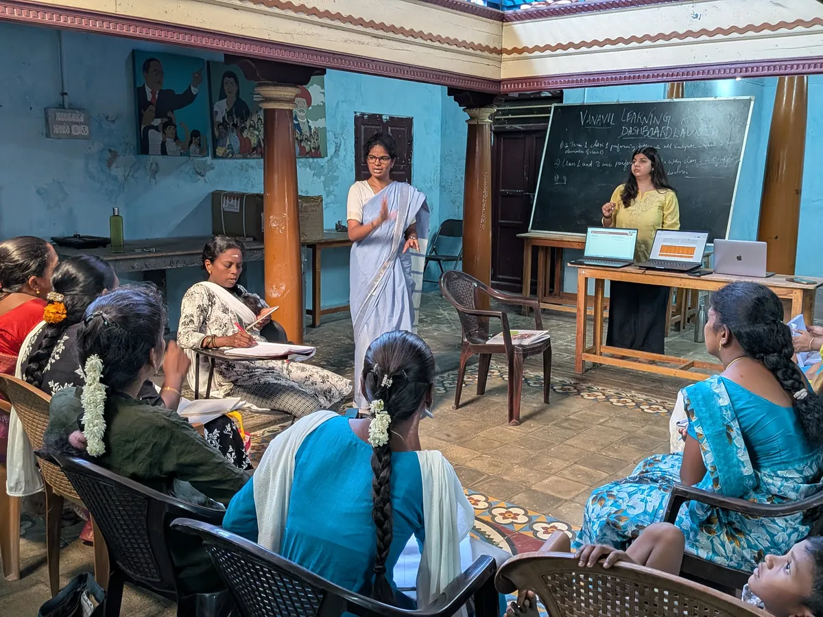 A programme session running in a village classroom